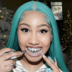 Kim Kardashian’s Daughter North Poses With Blue Hair and Diamonds