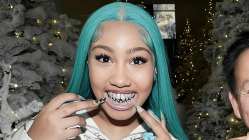 Kim Kardashian’s Daughter North Poses With Blue Hair and Diamonds